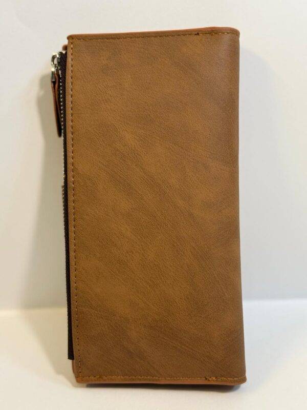 Elegant DOUX Wallet in brown leather on a white background.