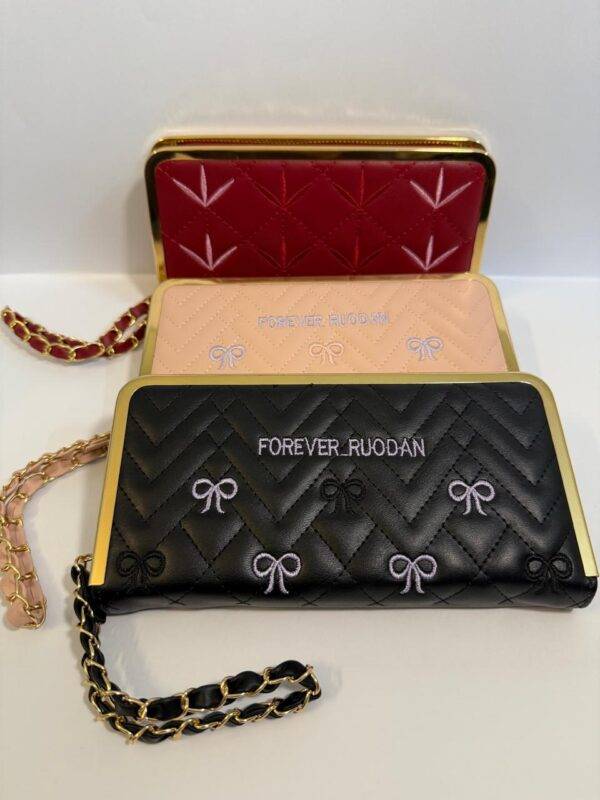 Front view of all Elegant Quilted Wallets emphasizing luxurious stitching and gold accents.